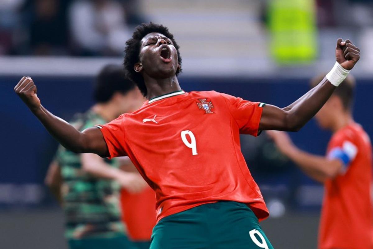 Portugal's forward #09 Anisio Cabral celebrates after scoring his team's first goal during the FIFA U17 World Cup final football match between Portugal and Austria at Khalifa International Stadium in Al-Rayyan on November 27, 2025.  Karim JAAFAR / AFP
