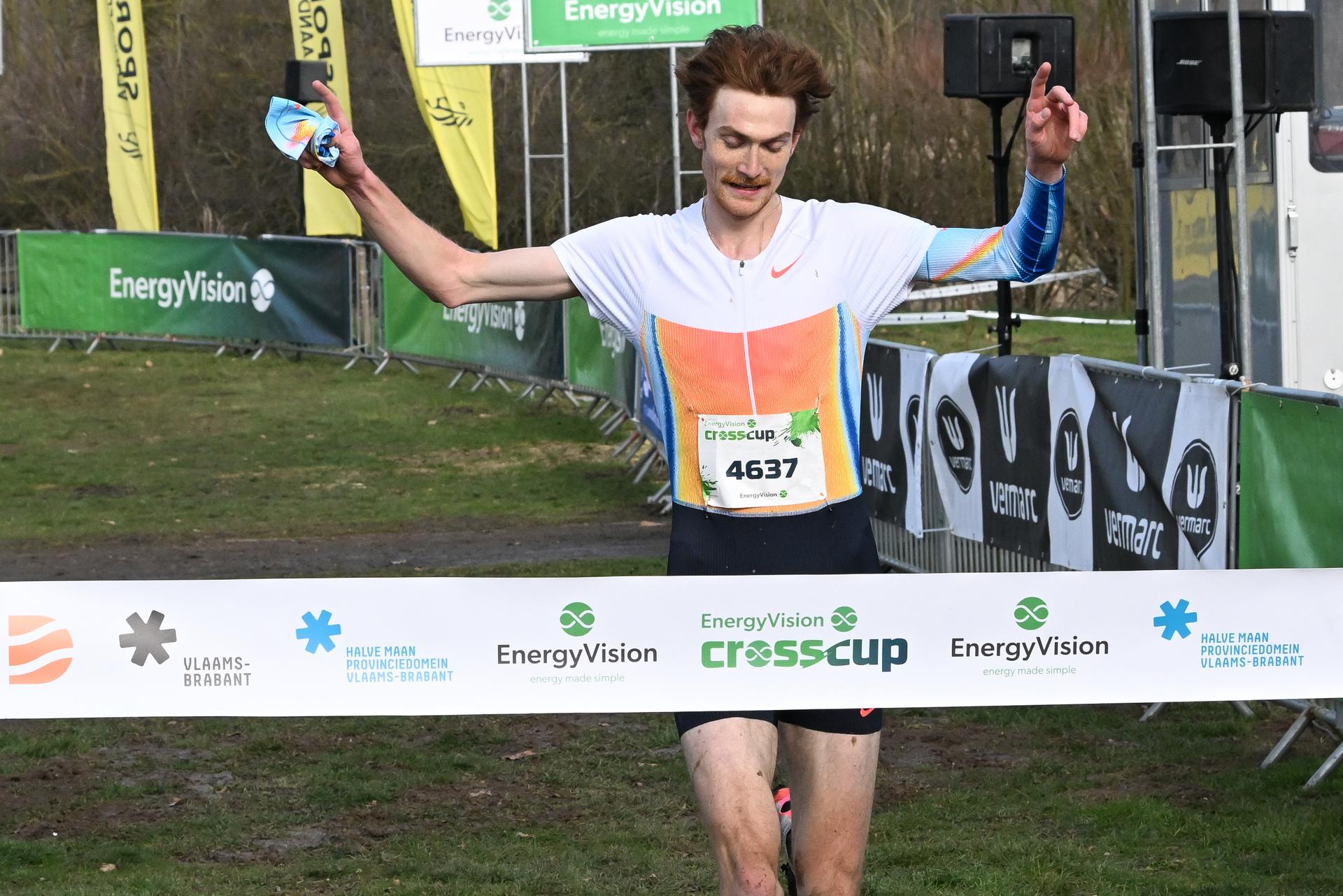 Luxembourg's Ruben Querinjean celebrates as he crosses the finish line to win the men's race at the CrossCup cross country running athletics event in Diest, the fourth stage of the CrossCup competition, on Sunday 15 February 2026. BELGA PHOTO JILL DELSAUX