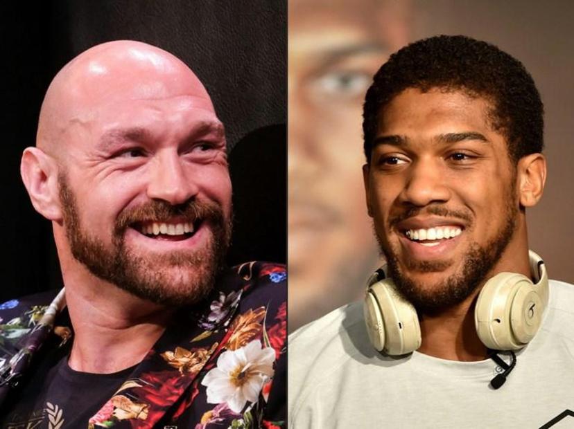 (COMBO) This combination of pictures created on December 14, 2020 shows Boxer Tyson Fury (L) during a press conference in Los Angeles, California on January 25, 2020, and British heavyweight boxer Anthony Joshua during a press conference in Ad Diriyah, a Unesco-listed heritage site, outside Riyadh, on December 4, 2019.  Anthony Joshua's promoter Eddie Hearn says a deal for his man to fight Tyson Fury in an all-British world heavyweight unification bout in 2021 could take as little as two days to complete. Plans for a Battle of Britain have accelerated after Joshua, 31, stopped Bulgarian veteran Kubrat Pulev in the ninth round at Wembley Arena on December 12 to retain all three of his belts. FAYEZ NURELDINE, RINGO CHIU / AFP