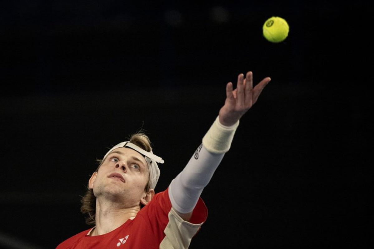 Belgian Zizou Bergs serves the ball to France's Ugo Humbert during their semi-final simple tennis match at the Marseille Open 13 ATP World Tour in Marseille, southern France on February 15, 2025.  MIGUEL MEDINA / AFP