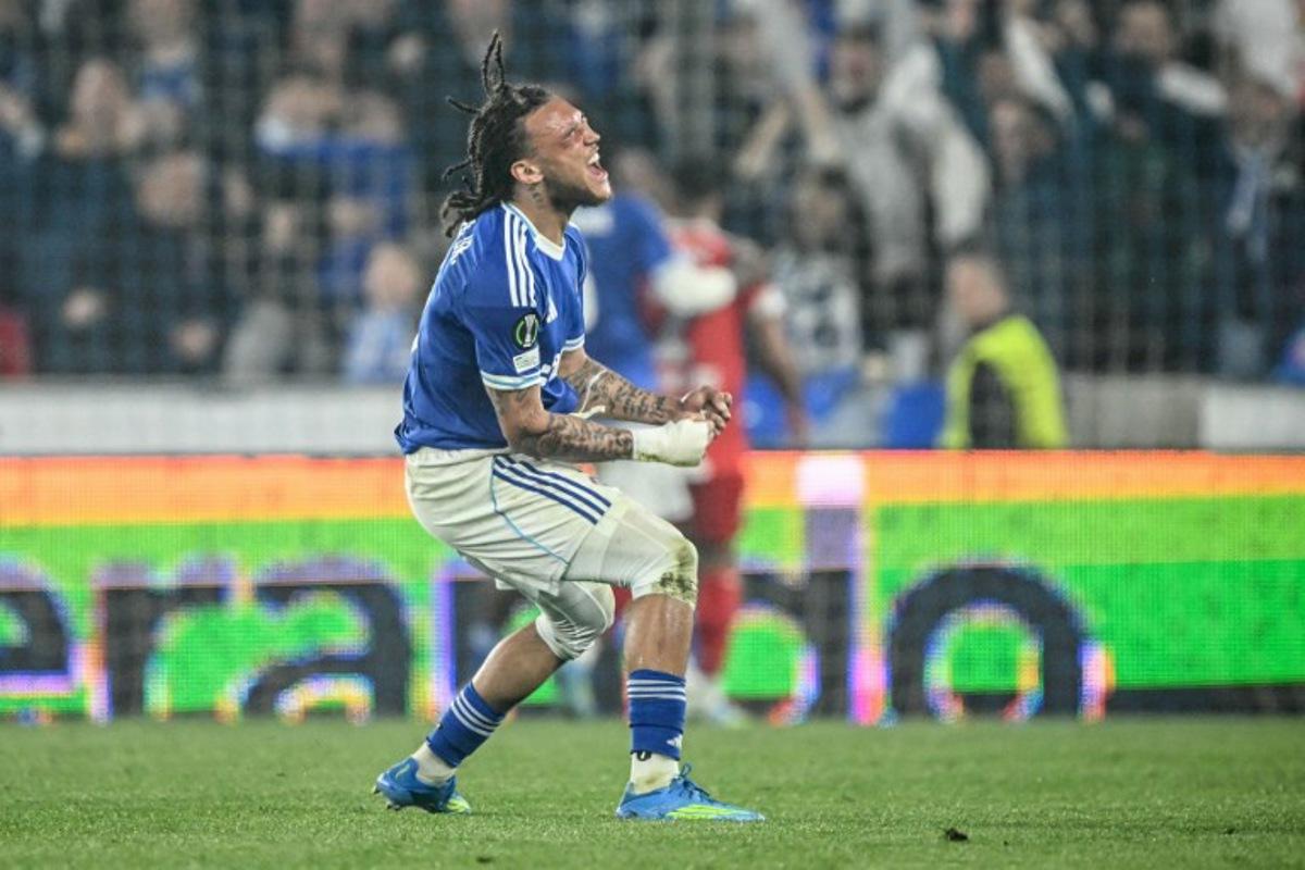 Strasbourg's Belgian midfielder #07 Diego Moreira celebrates after Strasbourg scored their first goal during the UEFA Europa Conference League quarter-final second leg football match between RC Strasbourg Alsace and Mainz 05 at the Stade de La Meinau in Strasbourg, eastern France, on April 16, 2026.  SEBASTIEN BOZON / AFP
