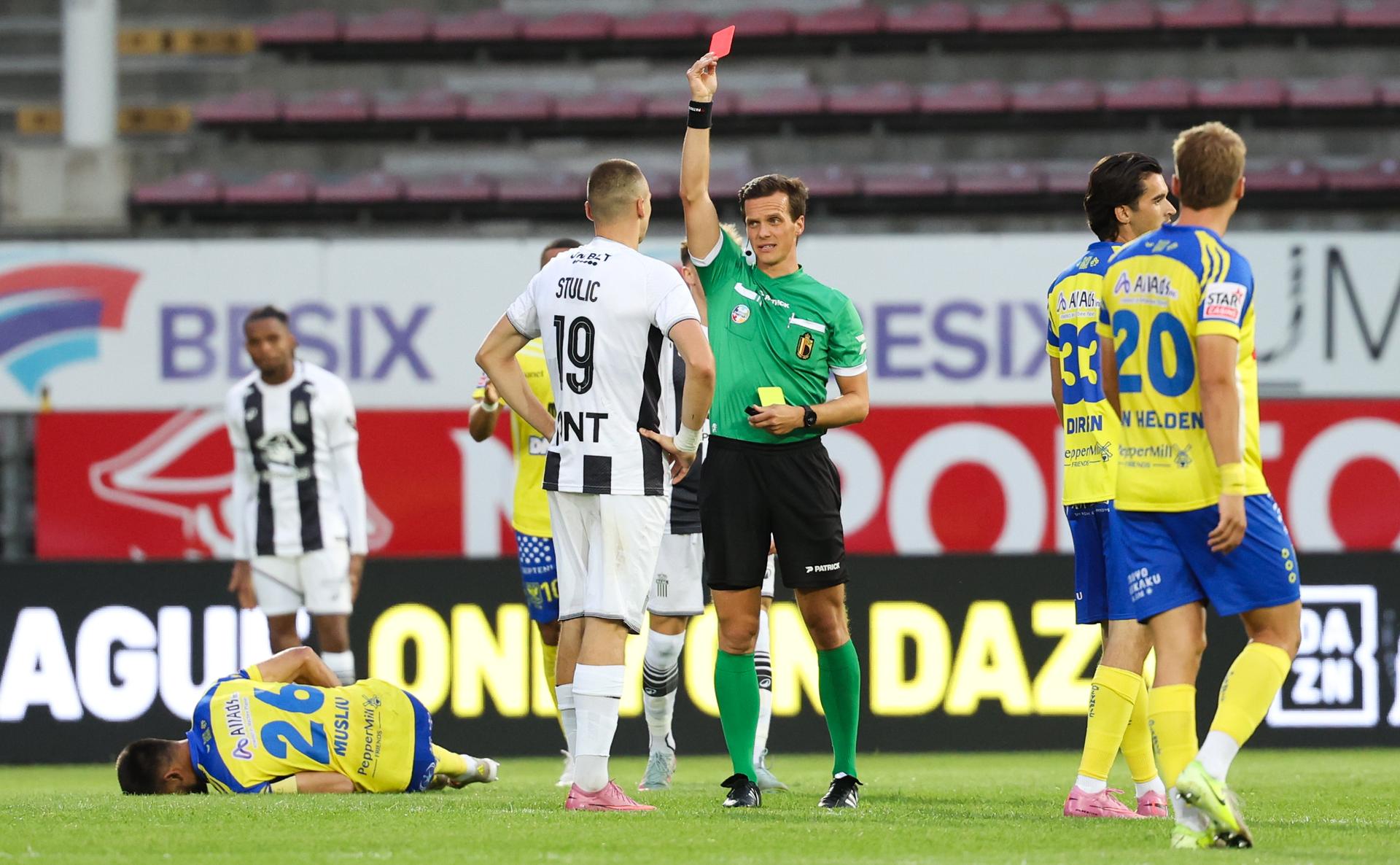 Charleroi's Nikola Stulic receives a red card from referee Kevin Van Damme during a soccer match between Sporting Charleroi and Sint-Truiden VV, Sunday 03 August 2025 in Charleroi, on day 2 of the 2025-2026 'Jupiler Pro League' first division of the Belgian championship. BELGA PHOTO VIRGINIE LEFOUR