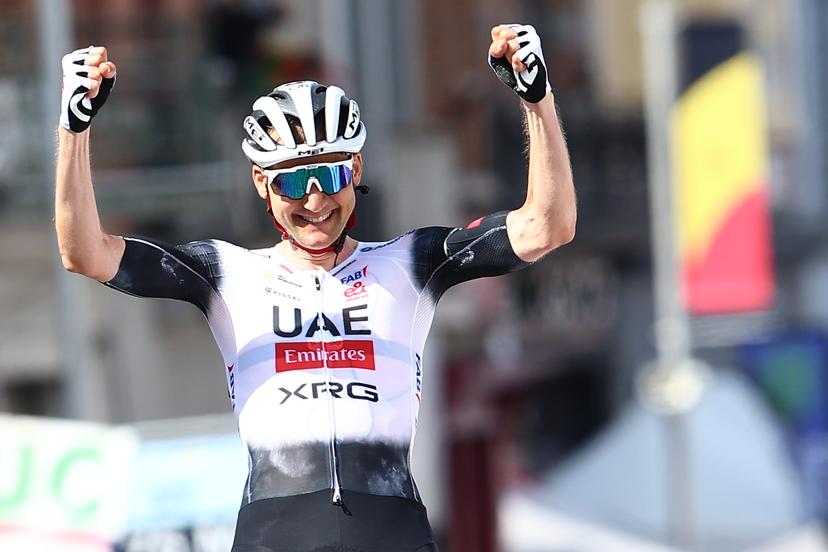 Belgian Tim Wellens of UAE Team Emirates celebrates as he wins the men's elite road race of the Belgian Cycling Championships, 230km from and to the Grand Place square in Binche on Sunday 29 June 2025. BELGA PHOTO DAVID PINTENS