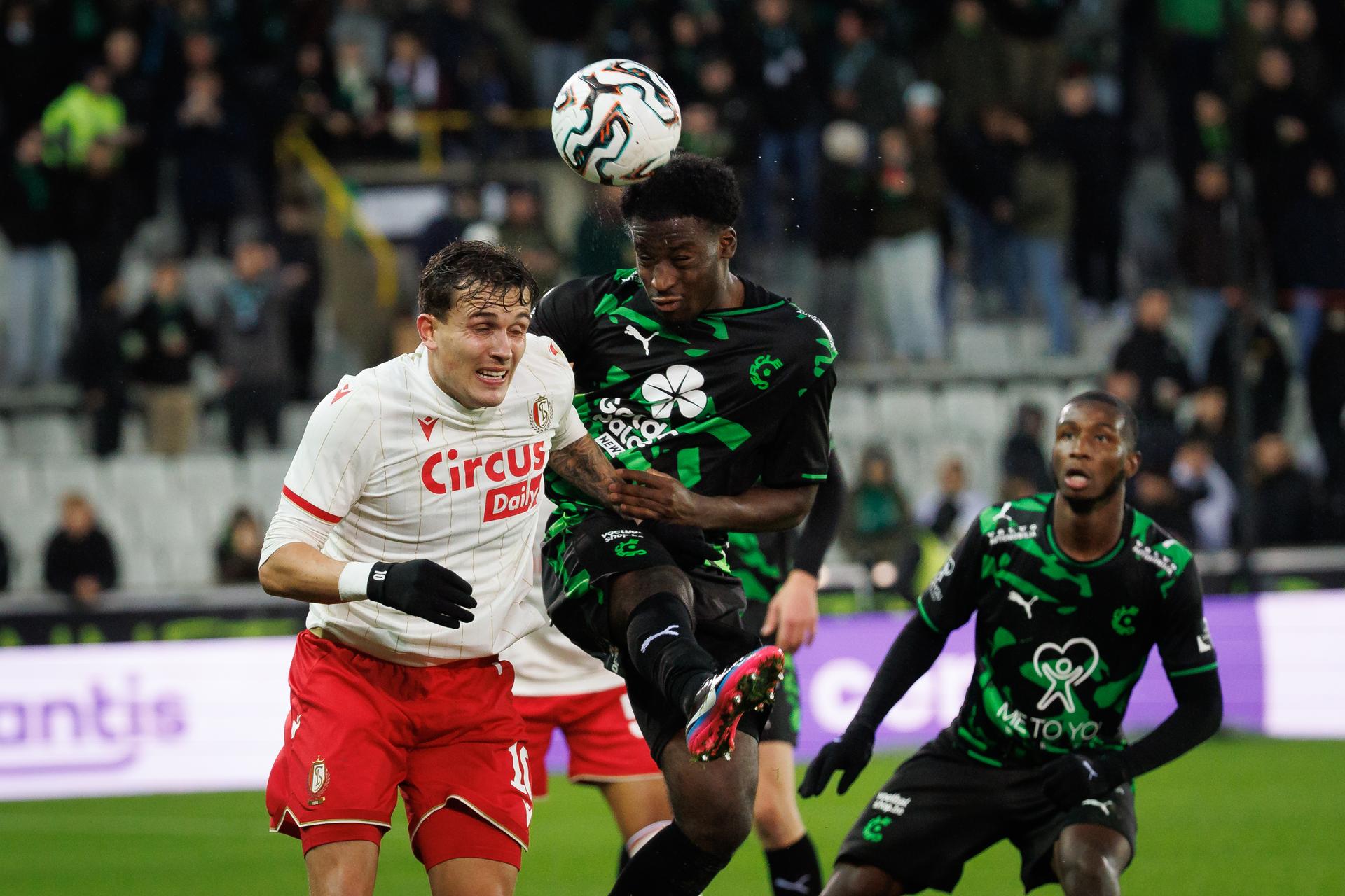 Standard's Dennis Ayensa and Cercle's Ibrahim Diakite fight for the ball during a soccer match between Cercle Brugge and Standard de Liege, Saturday 06 December 2025 in Brugge, on day 17 of the 2025-2026 'Jupiler Pro League' first division of the Belgian championship. BELGA PHOTO KURT DESPLENTER