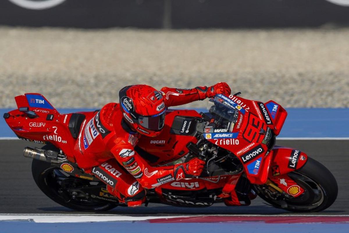 Ducati Lenovo's Spanish rider Marc Marquez takes part in the free practice session of the Qatar MotoGP Grand Prix at the Lusail International Circuit in Lusail, north of Doha, on April 11, 2025.  Karim JAAFAR / AFP