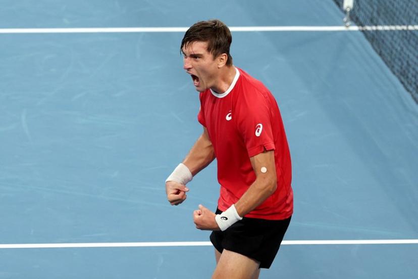 Belgium's Raphael Collignon reacts after defeating Australia's Alex de Minaur during the Davis Cup second-round qualifier tennis match at Ken Rosewall Arena in Sydney on September 13, 2025.   DAVID GRAY / AFP