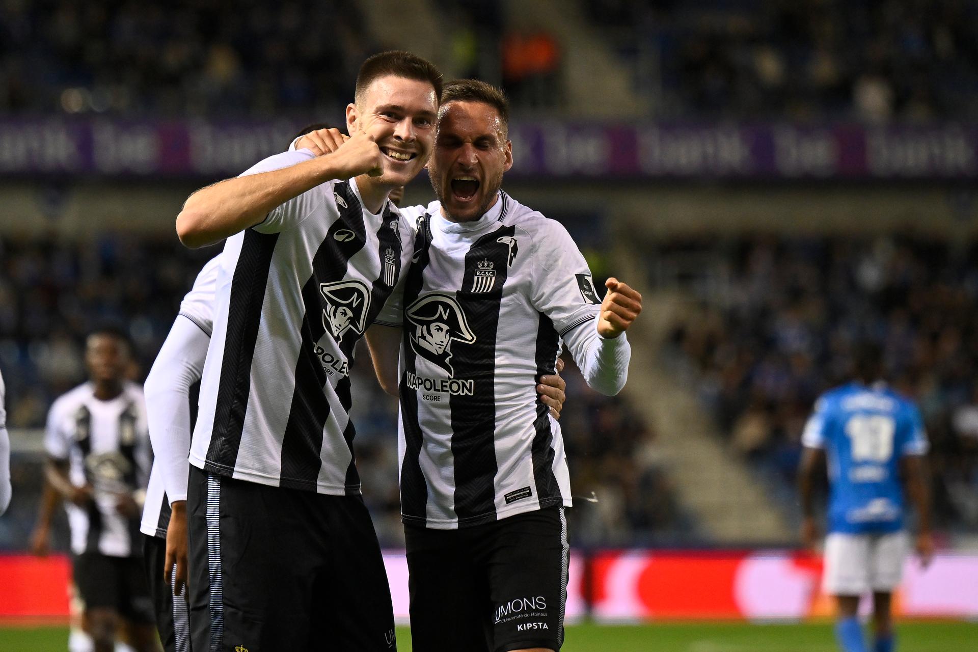 Charleroi's Aurelien Scheidler and Charleroi's Jules Gaudin celebrate after scoring during a soccer match between KRC Genk and Sporting Charleroi, Wednesday 17 September 2025 in Genk, a postponed game of day 5 of the 2025-2026 'Jupiler Pro League' first division of the Belgian championship. BELGA PHOTO JOHAN EYCKENS