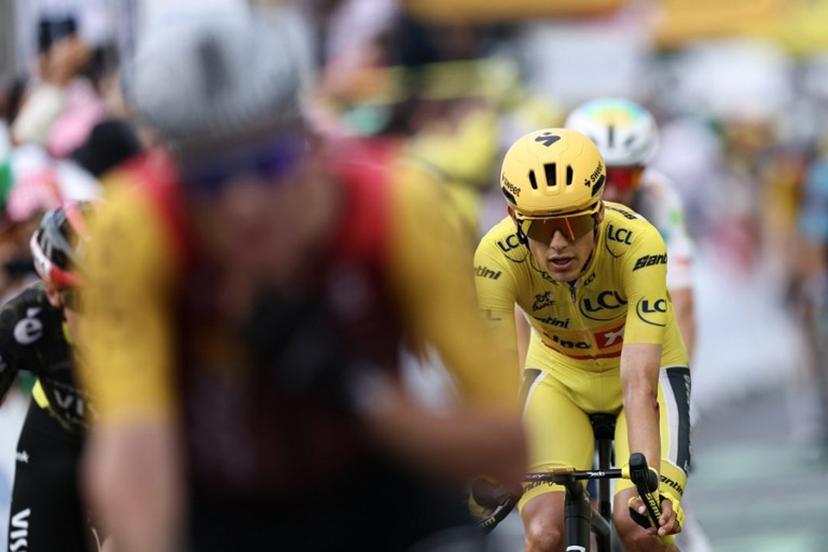 Uno-X Mobility team's Norwegian rider Torstein Traeen wearing the overall leader's yellow jersey crosses the finish line of the 5th stage of the 113th edition of the Tour de France cycling race, 158 km between Lannemezan and Pau in southwestern France, on July 8, 2026.  Anne-Christine POUJOULAT / AFP