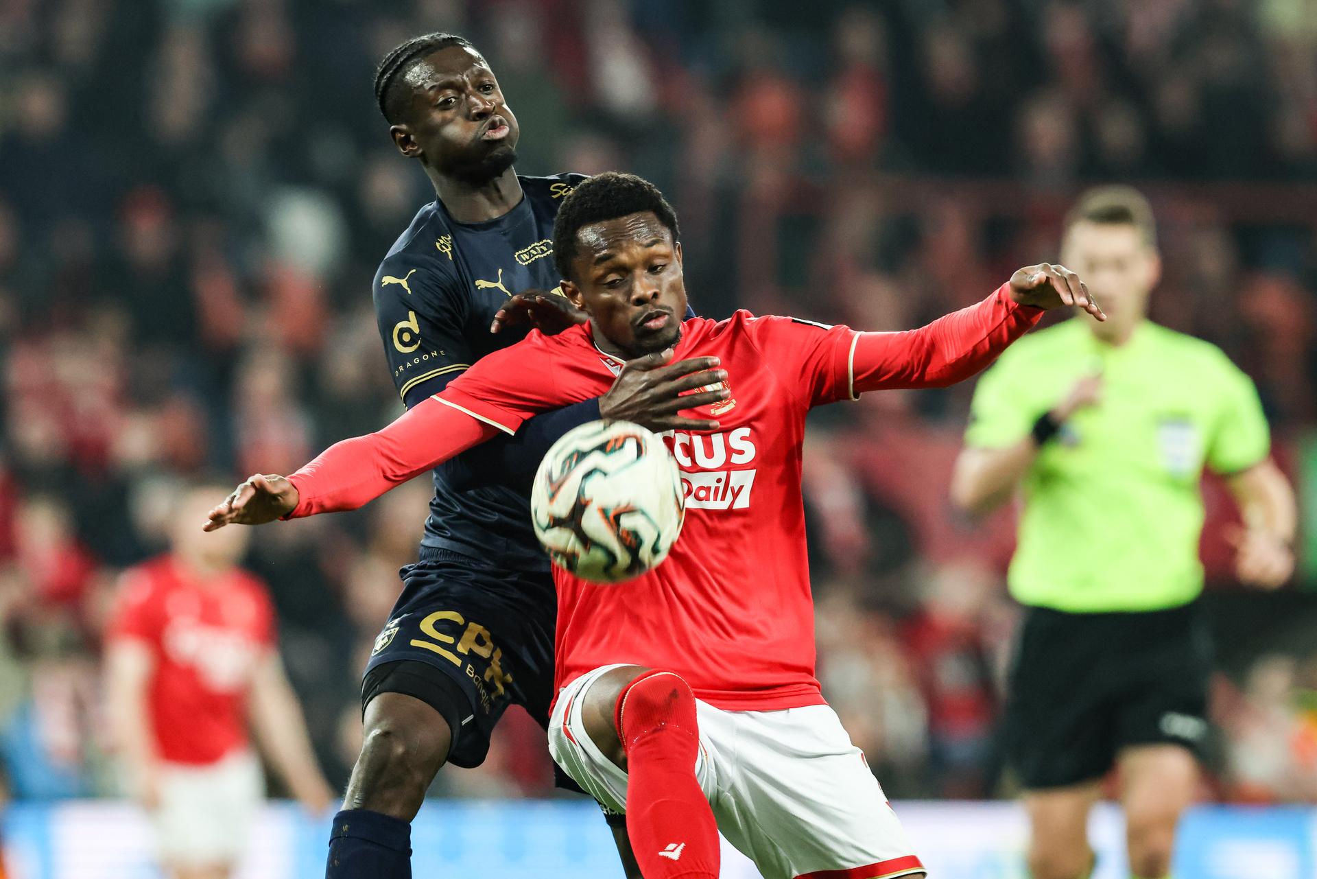 RAAL's Wagane Faye and Standard's Rafiki Said fight for the ball during a soccer match between Standard de Liege and RAAL La Louviere, Friday 27 February 2026 in Liege, on day 27 of the 2025-2026 'Jupiler Pro League' first division of the Belgian championship. BELGA PHOTO BRUNO FAHY