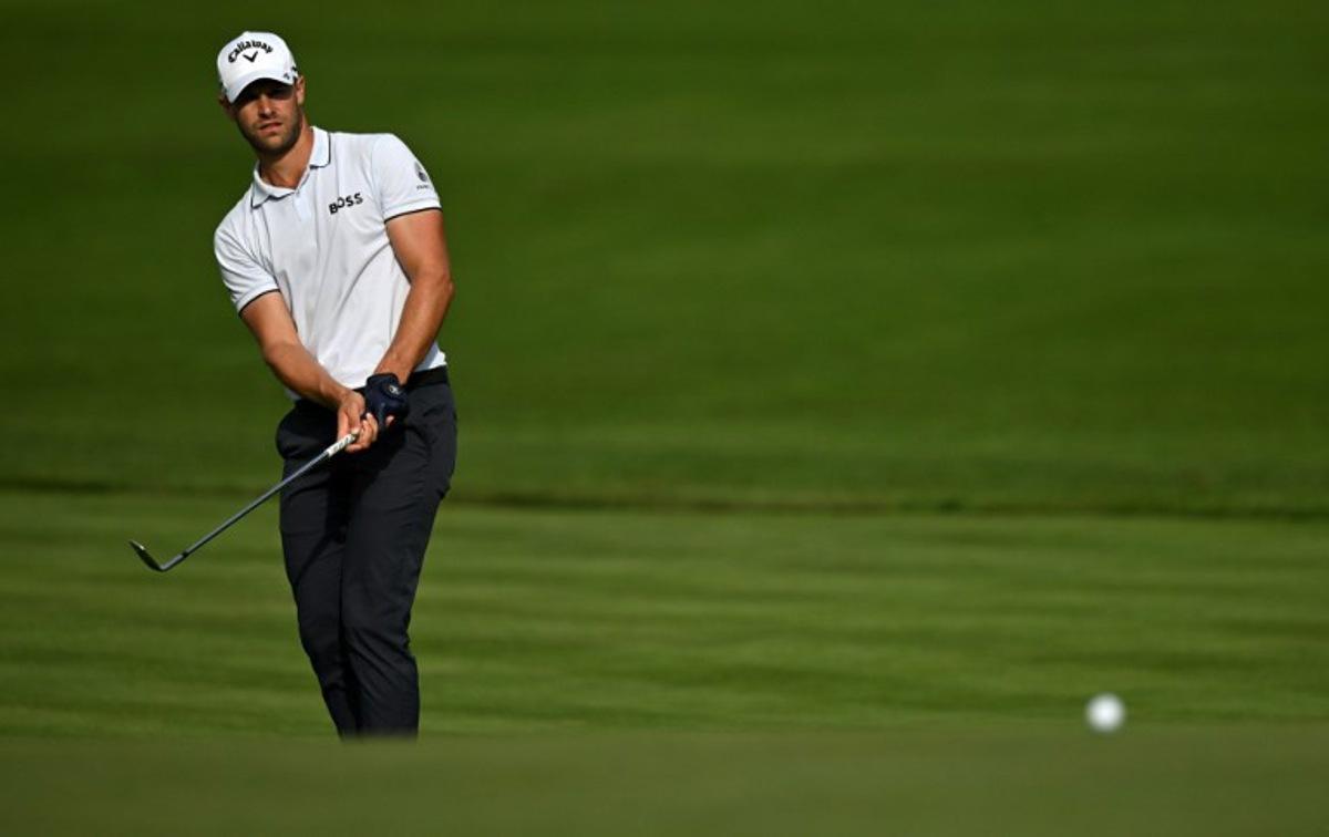Belgium's Thomas Detry chips onto the 12th green on day three of the BMW PGA Championship at Wentworth Golf Club, south-west of London, on September 16, 2023.  Glyn KIRK / AFP