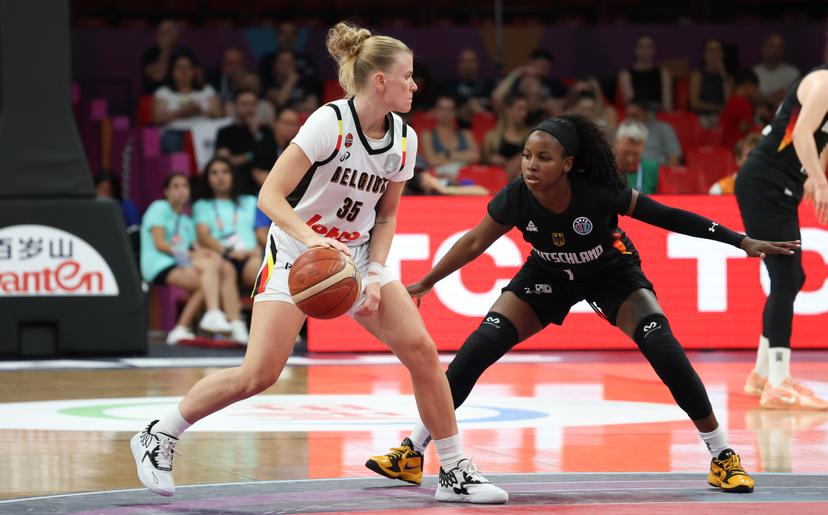 Belgium's Julie Vanloo and German Alexis Peterson fight for the ball during a basketball match between Belgian national team 'the Belgian Cats' and Germany, in the quarterfinals of the FIBA Women's EuroBasket tournament, Wednesday 25 June 2025 in Piraeus, Greece. BELGA PHOTO VIRGINIE LEFOUR
