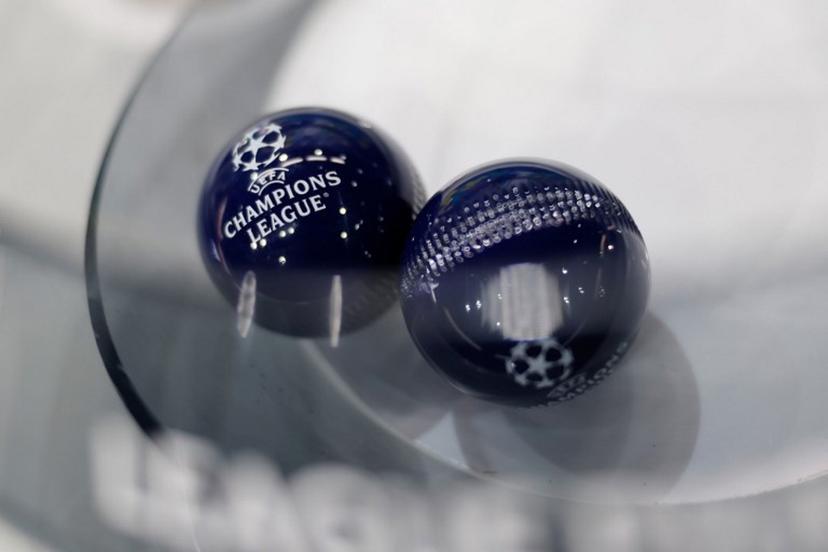 A photo shows draw balls woith the competition logo prior to the draw for the quarter-finals of the 2024-2025 UEFA Champions League football tournament at the House of European Football in Nyon, on February 21, 2025.  Valentin Flauraud / AFP