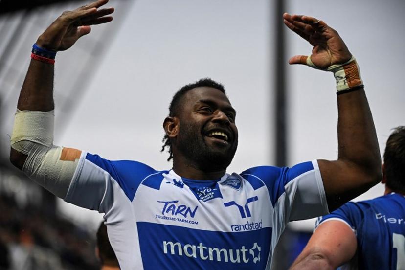 (FILES) Castres' Fiji wing Josaia Raisuqe celebrates after scoring a try during the French Top14 rugby union match between Castres Olympique and Rugby Club Toulonnais (Toulon) at The Pierre-Fabre Stadium in Castres, south-western France, on April 22, 2023. Josaia Raisuqe died on May 8, 2025 in a car accident after being hit by a train, according to the club, confirming information reported by the Rugbyrama website. Valentine CHAPUIS / AFP