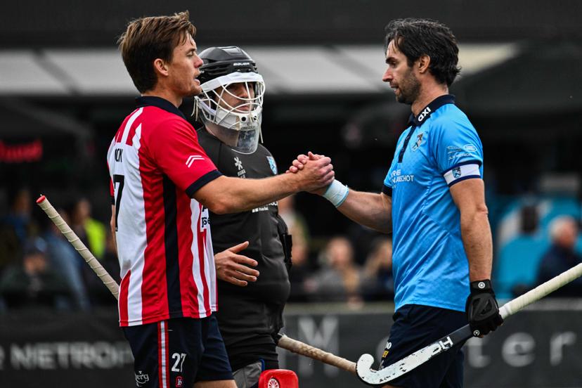 Leopold's Tom Boon and Braxgata's Loick Luypaert pictured after a hockey game between Braxgata and Leopold, Sunday 18 October 2026 in Boom, on day 6 of the Belgian first division hockey championship.  BELGA PHOTO EMILE WINDAL