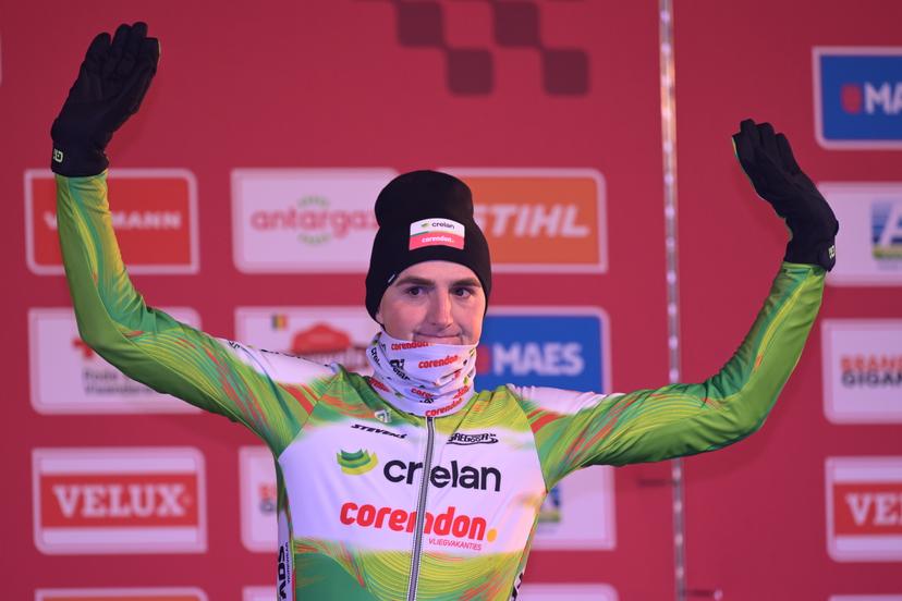Belgian Emiel Verstrynge celebrates on the podium at the men's elite race at the World Cup cyclocross cycling event in Zonhoven on Sunday 04 January 2026, stage 9 (out of 12) of the UCI World Cup competition. BELGA PHOTO DAVID PINTENS