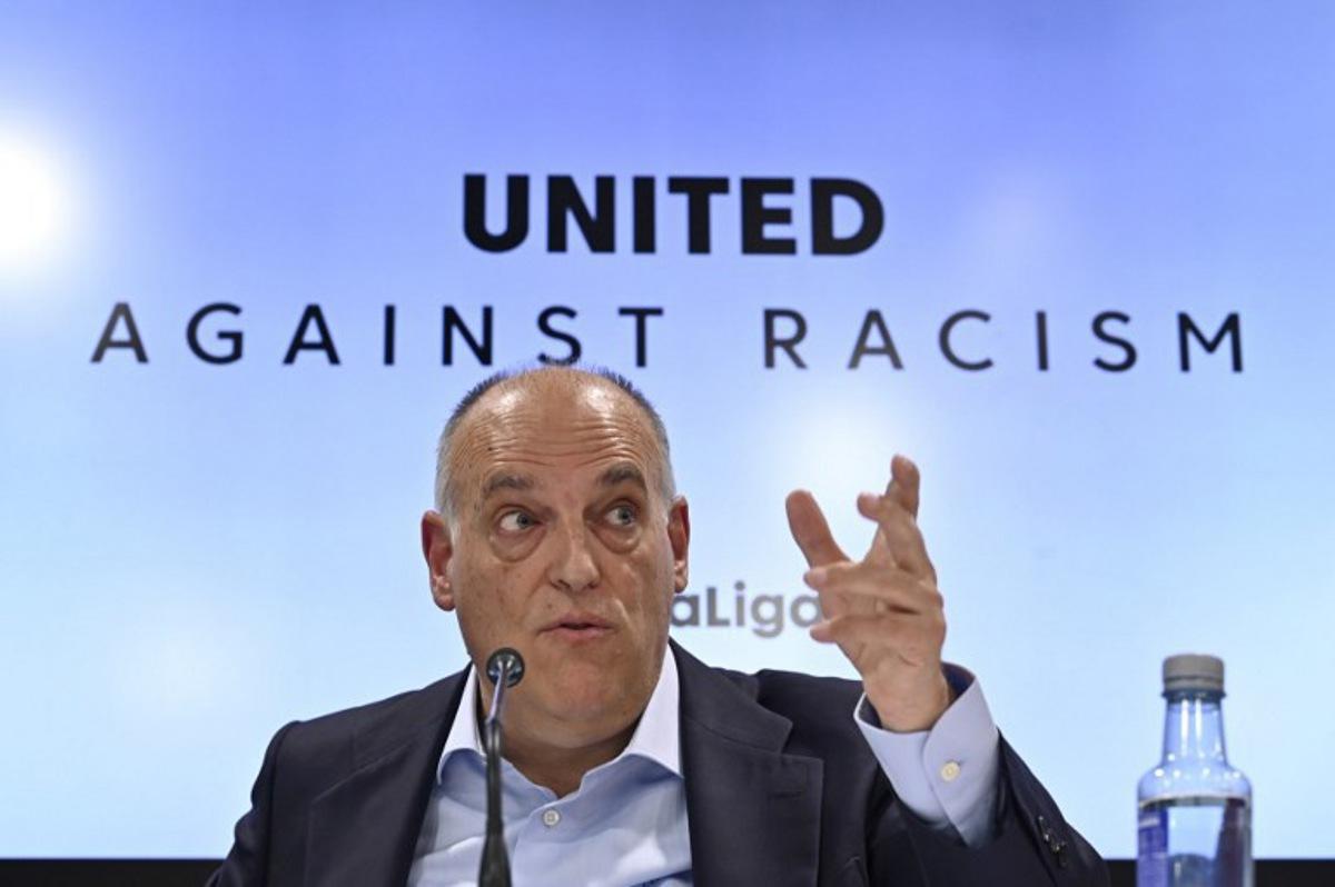 The president of the Spanish football league 'La Liga' Javier Tebas gestures as he gives a press conference in Madrid on May 25, 2023 amid an international outcry after racist abuse was hurled at Real Madrid's Brazilian forward Vinicius Junior during a Spanish league match. The 22-year-old Brazilian forward drew international support after making a stand against the last racist abuse he received from Valencia supporters on May 21.  OSCAR DEL POZO / AFP