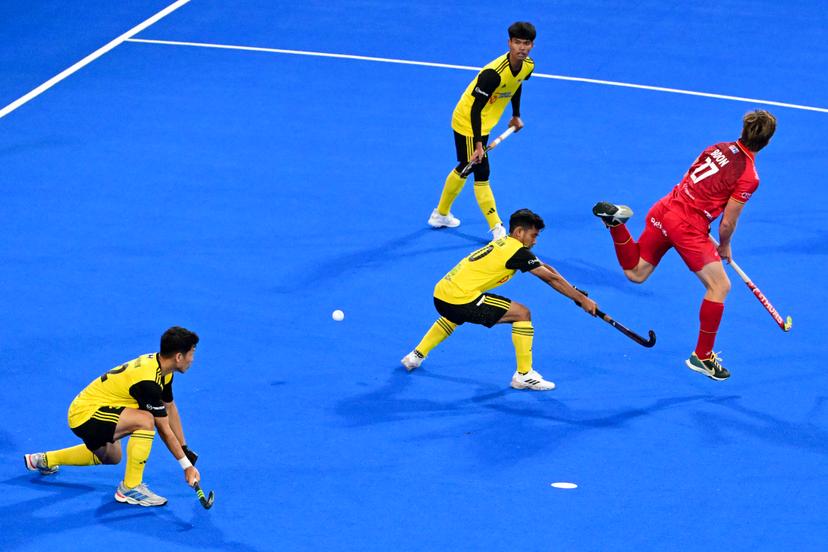Malaysia's Ashran Hamsani and Belgium's Tom Boon pictured in action during a hockey game between Belgian Lions and Malaysia, the third (out of three) matches during the group stage of the men's 2026 Hockey World Cup, Wednesday 19 August 2026 in Wavre. The 2026 edition of the Hockey World Cup takes place in Belgium and The Netherlands from August 15 to August 30. BELGA PHOTO DIRK WAEM
