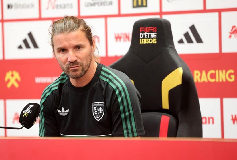 RC Lens interim coach Yannick Cahuzak speaks during his official presentation at the "La Gayette" training centre in Avion, near Lens, on September 17, 2026. Cahuzac takes over from German coach Dino Toppmoller, whose departure was announced by the club on September 16, 2026, after a disagreement over the organisation of the coaching staff. Francois LO PRESTI / AFP