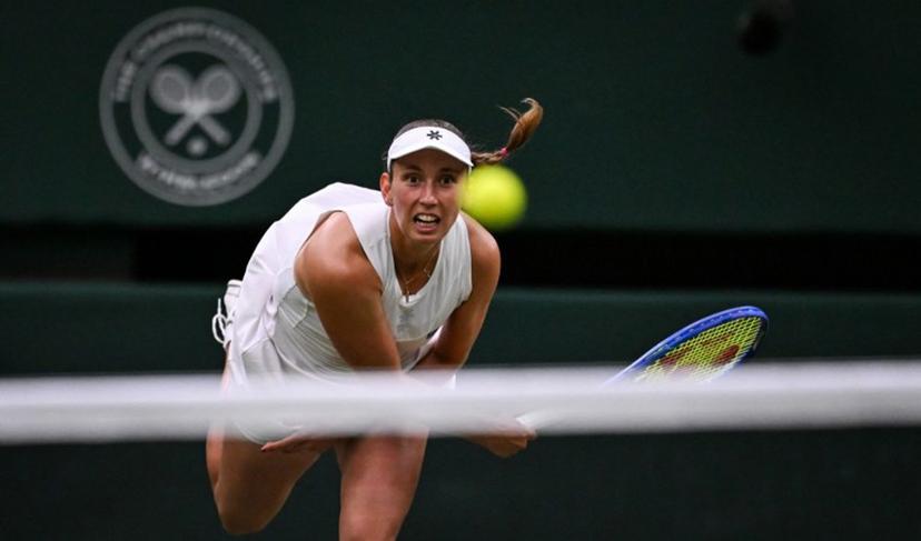 Belgium's Elise Mertens eyes the ball as she returns it to Belarus's Aryna Sabalenka during their women's singles fourth round tennis match on the seventh day of the 2025 Wimbledon Championships at The All England Lawn Tennis and Croquet Club in Wimbledon, southwest London, on July 6, 2025.  Kirill KUDRYAVTSEV / AFP
