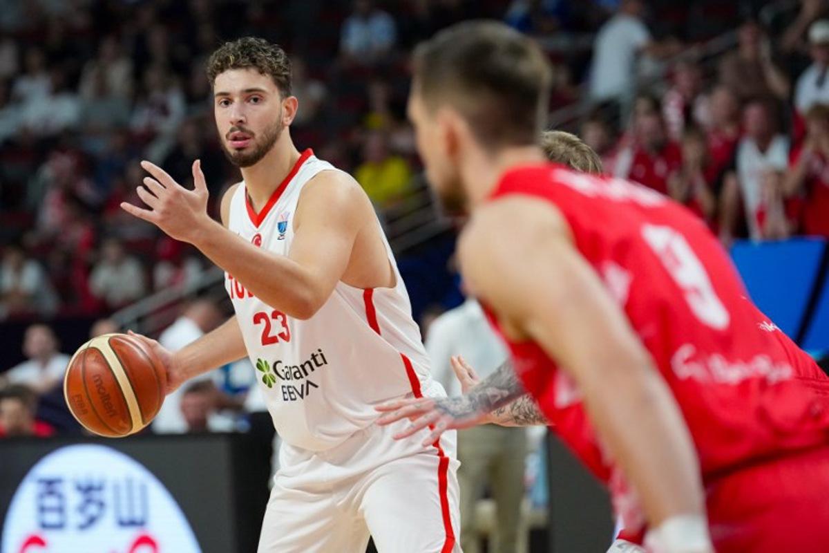 Turkey's power forward #23 Alperen Sengun vie during the FIBA EuroBasket 2025 quarter-final basketball match between Turkey and Poland in Riga, Latvia, on September 9, 2025.  Gints Ivuskans / AFP