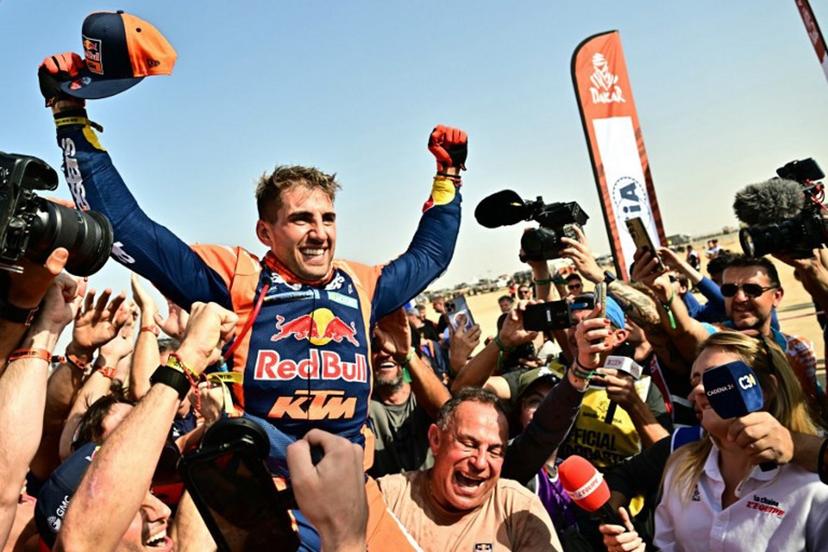 Argentine rider Luciano Benavides with a Ktm 450 Rally Factory celebrates after winning the 48th edition of the Dakar Rally 2026 in Yanbu, Saudi Arabia, on January 17, 2026.  Giuseppe CACACE / AFP