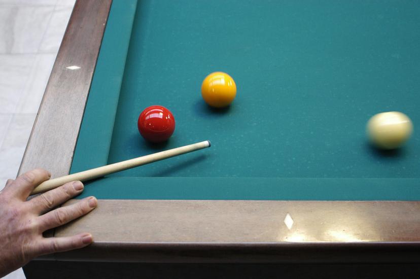 BRU71 - 20051226 - GROBBENDONK, BELGIUM : Illustration picture shows someone playing billiards at the Cassiers brasserie, where the 6 days of Grobbendonk ( zes daagse van Grobbendonk) started this 26 December 2005, billiards for a good cause. BELGA PHOTO DIRK WAEM