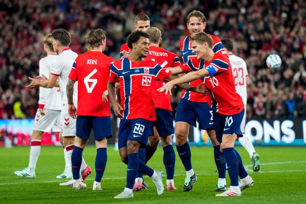 Norway's midfielder #22 Oscar Bobb (C) celebrates scoring his team's first goal with teammates during the UEFA Nations League Group A4 football match between Norway and Denmark in Oslo on September 24, 2026.  Fredrik Varfjell / NTB / AFP