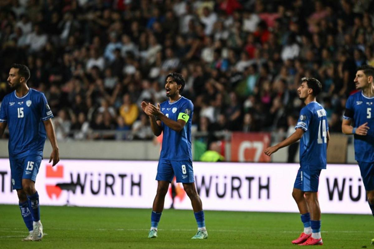 Israel's midfielder #08 Dor Peretz (C) celebrates after scoring the 404 goal during the 2026 World Cup qualifiers Europe zone group I football match between Israel and Italy on September 8, 2025 in Debrecen, Hungary.  Attila KISBENEDEK / AFP