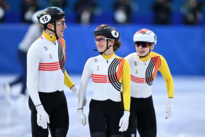 Belgian shorttrack skater Stijn Desmet, Belgian shorttrack skater Hanne Desmet and Belgian shorttrack skater Tineke den Dulk celebrate their bronze medal in the Final of the Mixed Team Relay of the Short Track Speed Skating competition at the Milano Cortina 2026 Olympic Winter Games, on Tuesday 10 February 2026 in Milan, Italy. The XXV Winter Olympics take place from 6 to 22 February 2026 in Italy. BELGA PHOTO JASPER JACOBS