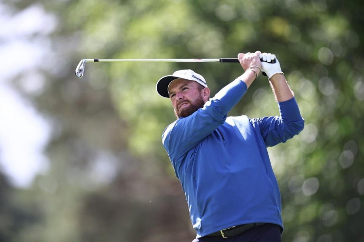 Ireland's Shane Lowry tees off on the 14th on the second day of the BMW PGA Championship at Wentworth Golf Club, south-west of London, on September 12, 2025.  HENRY NICHOLLS / AFP
