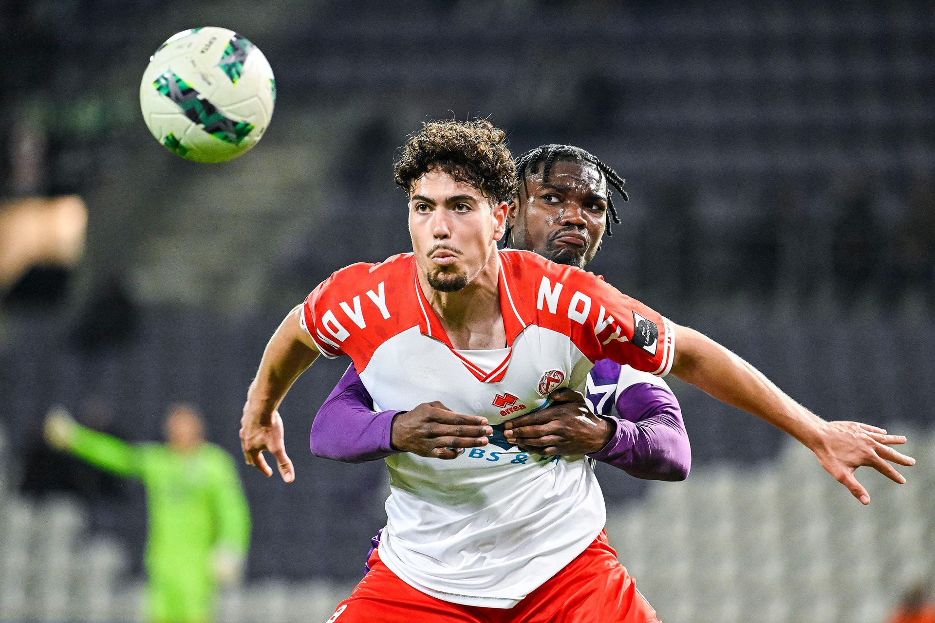 Kortrijk's Nacho Ferri and Beerschot's Loic Mbe Soh pictured in action during a soccer match between Beerschot VA and KV Kortrijk, Friday 25 April 2025 in Kortrijk, on day 4 (out of 6) of the Relegation Play-offs of the 2024-2025 'Jupiler Pro League' first division of the Belgian championship. BELGA PHOTO TOM GOYVAERTS