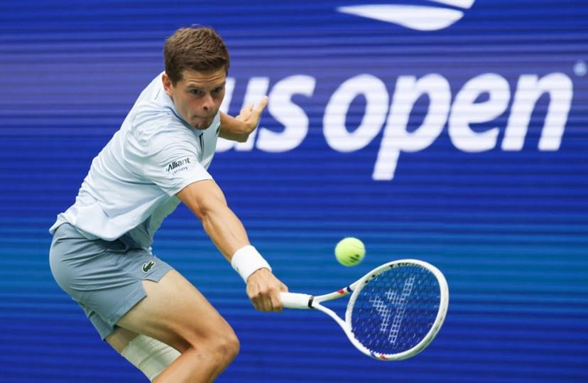 Belgium's Alexander Blockx returns the ball to Russia's Karen Khachanov during the men's singles quarter-final tennis match on day eleven of the US Open tennis tournament at the USTA Billie Jean King National Tennis Center in New York City on September 9, 2026.  TIMOTHY A. CLARY / AFP