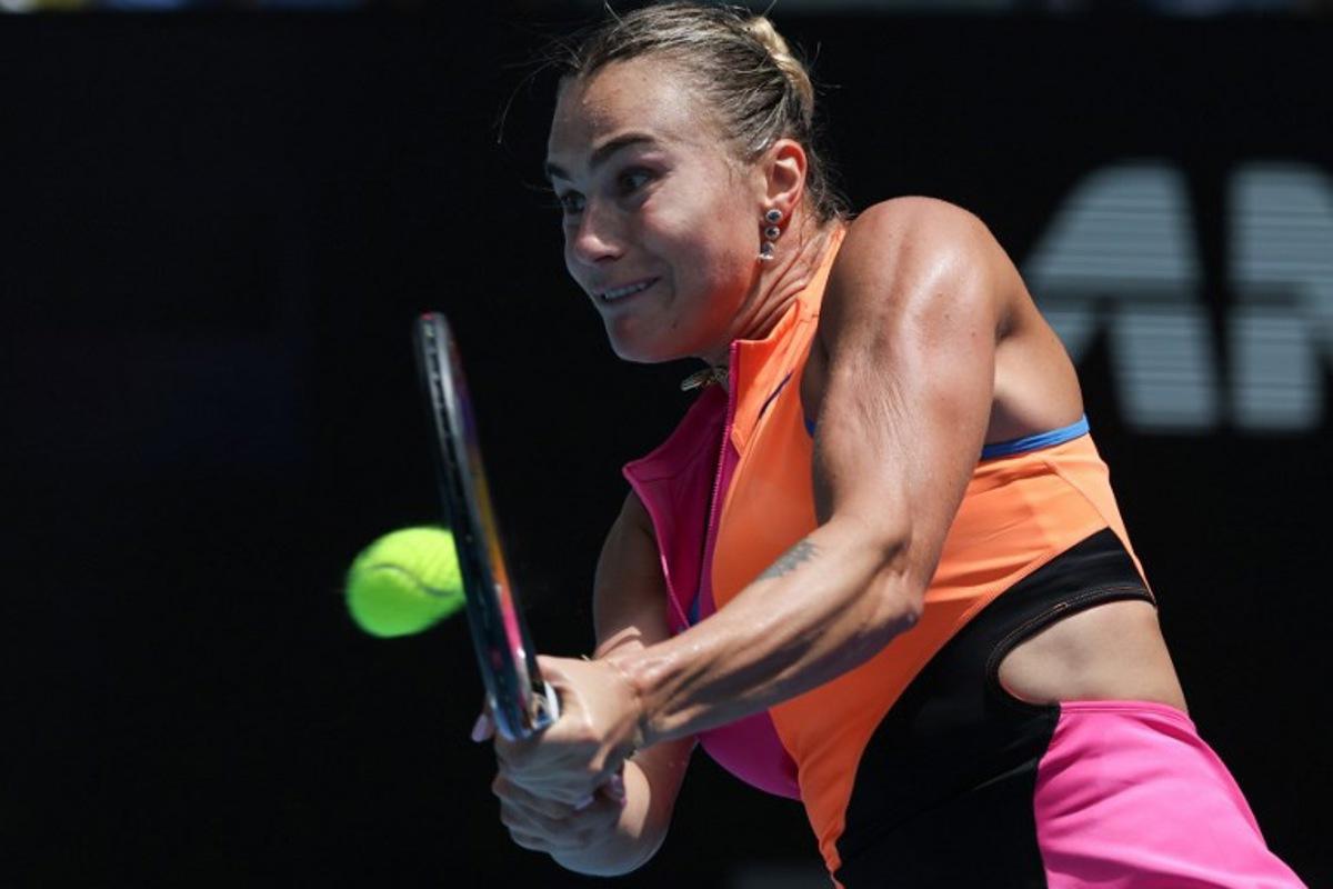 Belarus' Aryna Sabalenka hits a return against Canada's Victoria Mboko during their women's singles match on day eight of the Australian Open tennis tournament in Melbourne on January 25, 2026.  DAVID GRAY / AFP