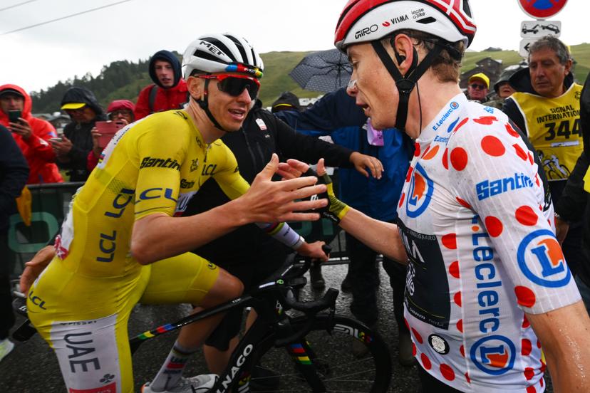 Slovenian Tadej Pogacar of UAE Team Emirates, Danish Jonas Vingegaard Hansen of Team Visma-Lease a Bike and pictured shaking hands after the stage 19 of the 2025 Tour de France cycling race, from Albertville to La Plagne (130km), on Friday 25 July 2025 in France. The 112th edition of the Tour de France starts on Saturday 5 July in Lille, France, and will finish in Paris, France on the 27th of July.   BELGA PHOTO POOL VINCENT KALUT