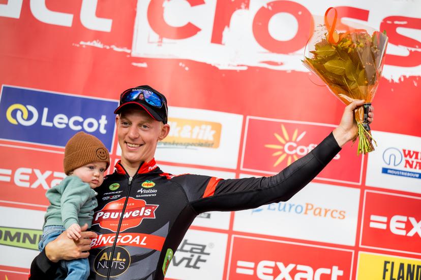Belgian Michael Vanthourenhout celebrates on the podium after winning the men's elite race of the 'Berencross Meulebeke' cyclocross cycling event, race 3/8 in the 'Exact Cross' competition, Saturday 01 October 2022 in Meulebeke. BELGA PHOTO JASPER JACOBS