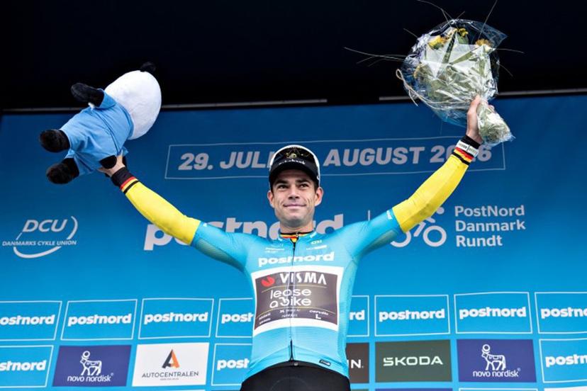 UCI WorldTeam Visma-Lease a Bike's Belgian rider Wout Van Aert celebrates winning  on the podium after the 3rd stage of the PostNord Denmark Tour on July 31, 2026 in Fredericia, Denmark.   Henning Bagger / Ritzau Scanpix / AFP