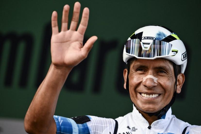(FILES) Movistar Team's Colombian riderNairo Quintana looks on from the sign-in podium ahead of the 119th edition of the Giro di Lombardia (Tour of Lombardy), a 238km cycling race from Como to Bergamo on October 11, 2025. Colombian cyclist Nairo Quintana, one of Latin America's most successful riders and a prominent figure in the peloton, announced on March 22, 2026, that he will retire at the end of the 2026 season. Marco BERTORELLO / AFP