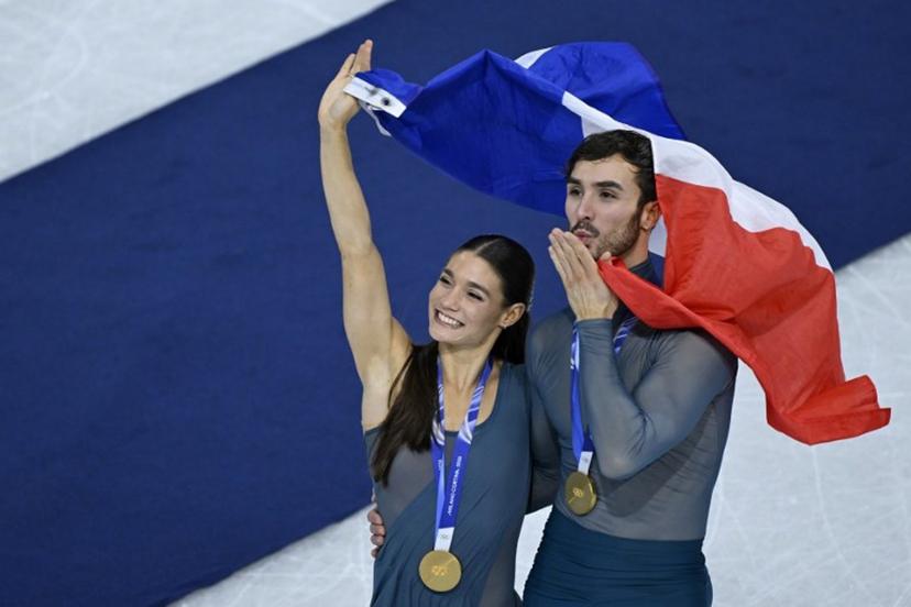 Gold medallists France's Laurence Fournier Beaudry and Guillaume Cizeron pose after the victory ceremony of the figure skating ice dance-free dance final during the Milano Cortina 2026 Winter Olympic Games at Milano Ice Skating Arena in Milan on February 11, 2026.  WANG Zhao / AFP