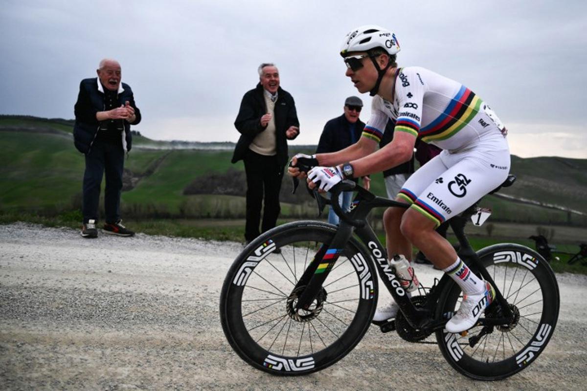 UAE Team Emirates's Slovenian Tadej Pogacar leads during the 20th one-day classic 'Strade Bianche' (White Roads) men's cycling race between Siena and Siena in Tuscany on March 7, 2026.  Marco BERTORELLO / AFP