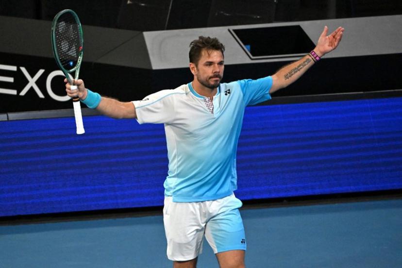 Switzerland's Stan Wawrinka reacts after a point against USA's Taylor Fritz during their men's singles match on day seven of the Australian Open tennis tournament in Melbourne on January 24, 2026.  Paul Crock / AFP