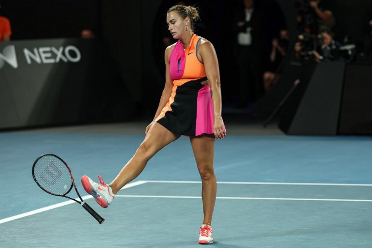 Belarus' Aryna Sabalenka throws her racquet after a point against Kazakhstan's Elena Rybakina during their women's singles final match on day fourteen of the Australian Open tennis tournament in Melbourne on January 31, 2026.  IZHAR KHAN / AFP