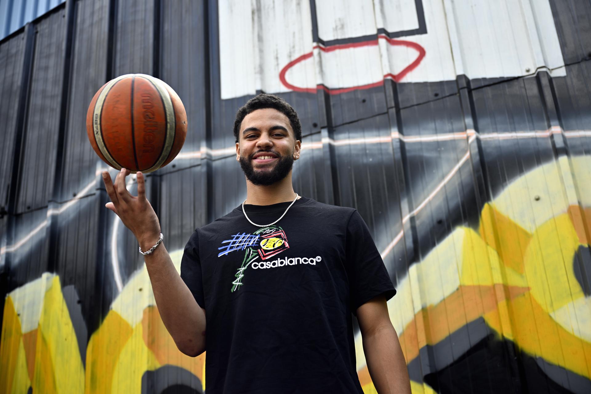 Ajay Mitchell poses for the photographer during a press conference regarding the NBA US basketball competition on Wednesday 30 July 2025 in Ans. Oklahoma City Thunder, featuring Belgian point guard Mitchell, won the league. BELGA PHOTO ERIC LALMAND
