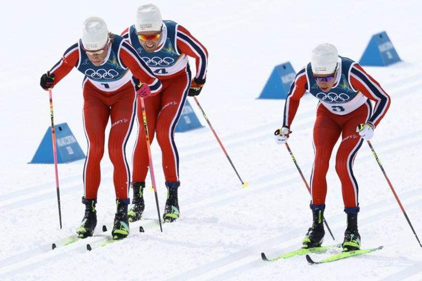 (From L) Norway's Johannes Hoesflot Klaebo, Norway's Emil Iversen and Norway's Martin Loewstroem Nyenget compete during the men's cross country 50km mass start final event of the Milano Cortina 2026 Winter Olympic Games at Tesero Cross-Country Skiing Stadium in Lago di Tesero (Val di Fiemme) on February 21, 2026.  Anne-Christine POUJOULAT / AFP