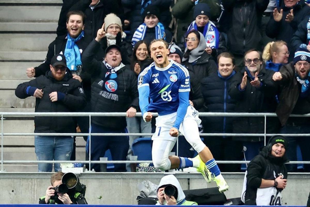 Strasbourg's Belgian midfielder #07 Diego Moreira celebrates scoring his team's first goal during the French L1 football match between RC Strasbourg Alsace and FC Metz at the Stade de la Meinau in Strasbourg, eastern France, on January 18, 2026.   Frederick FLORIN / AFP