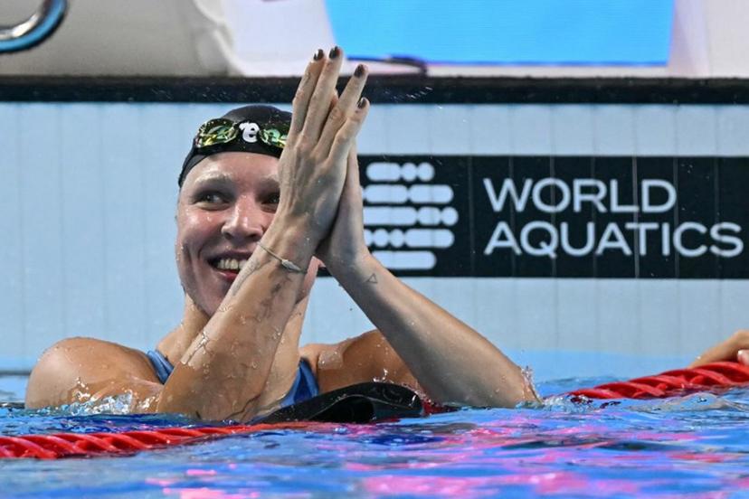 Lithuania's swimmer Ruta Meilutyte celebrates after winning the women's 50m breaststroke swimming event during the 2025 World Aquatics Championships in Singapore on August 3, 2025.  Manan VATSYAYANA / AFP