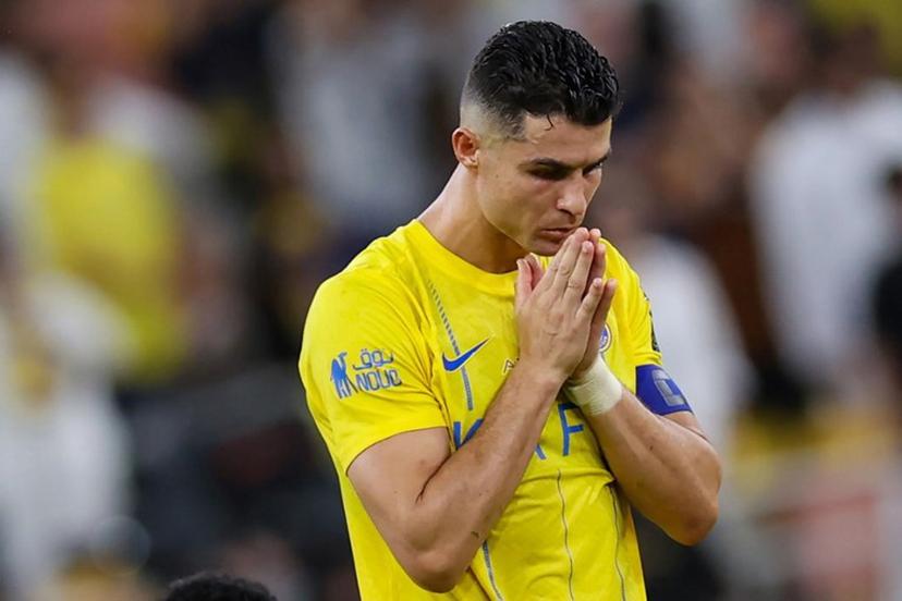 Nassr's Portuguese forward #07 Cristiano Ronaldo reacts during the penalty shootout of the King's Cup final match between Al-Nassr and Al-Hilal at the King Abdullah Sport City Stadium in Jeddah on May 31, 2024.  AFP