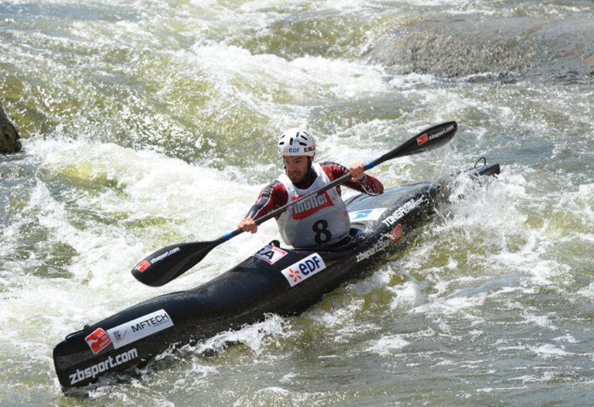 French Theo Devard competes in the Kayak K1 men race at the ICF Wildwater Canoeing Sprint World in the southern German city of  Augsburg, on June 12, 2011. AFP PHOTO/CHRISTOF STACHE  CHRISTOF STACHE / AFP