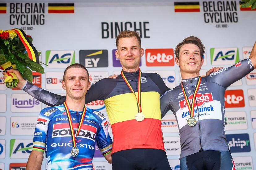Belgian Remco Evenepoel of Soudal Quick-Step, Belgian Tim Wellens of UAE Team Emirates and Belgian Jasper Philipsen of Alpecin-Deceuninck pictured on the podium after the men's elite road race of the Belgian Cycling Championships, 230km from and to the Grand Place square in Binche on Sunday 29 June 2025. BELGA PHOTO DAVID PINTENS