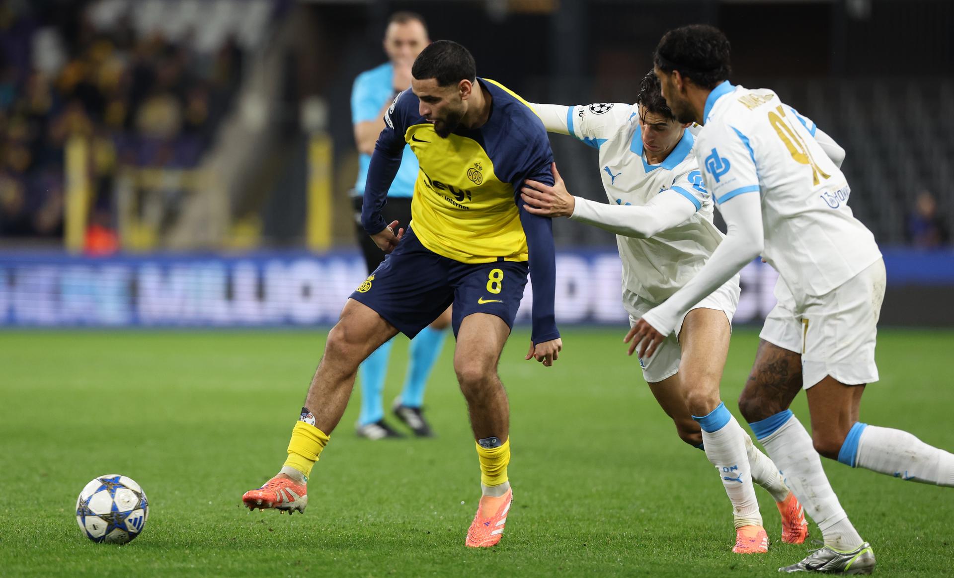 Union's Adem Zorgane and Marseille's Nayef Aguerd fight for the ball during a soccer game between Belgian Royale Union Saint-Gilloise and French Olympique de Marseille, on Tuesday 09 December 2025 in Brussels, on the sixth day of the League phase of the UEFA Champions League tournament. BELGA PHOTO VIRGINIE LEFOUR