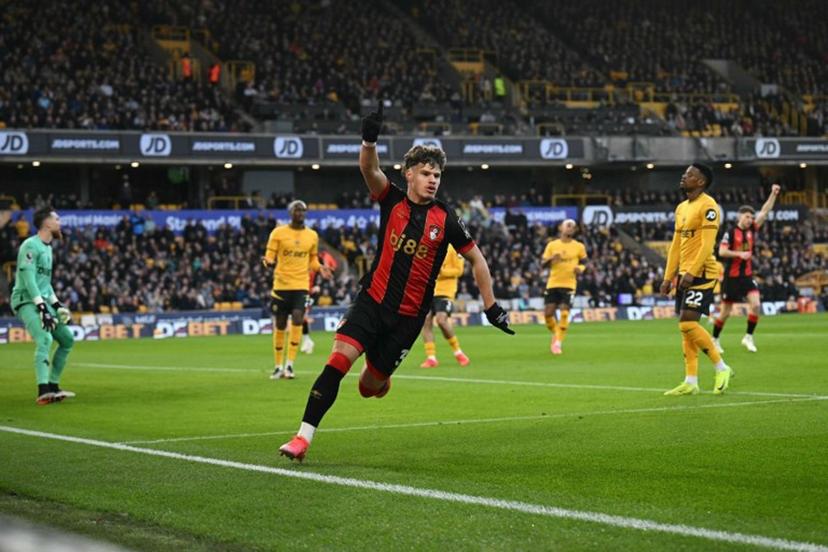 Bournemouth's Hungarian defender #03 Milos Kerkez celebrates scoring the team's second goal during the English Premier League football match between Wolverhampton Wanderers and Bournemouth at the Molineux stadium in Wolverhampton, central England on November 30, 2024.  Oli SCARFF / AFP